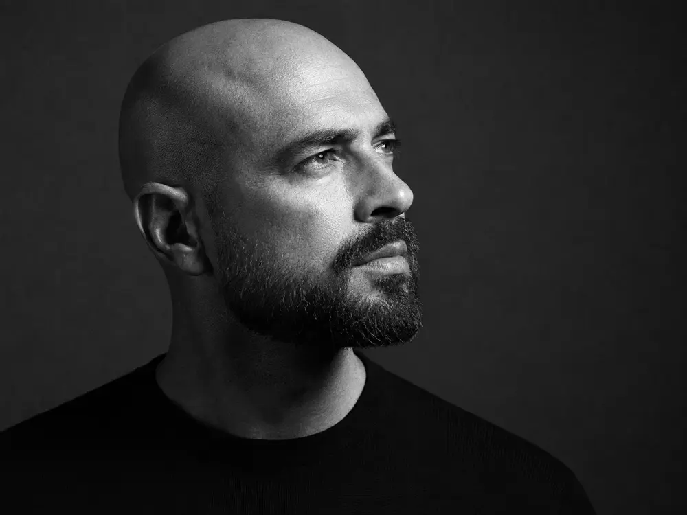Bald man with a close beard